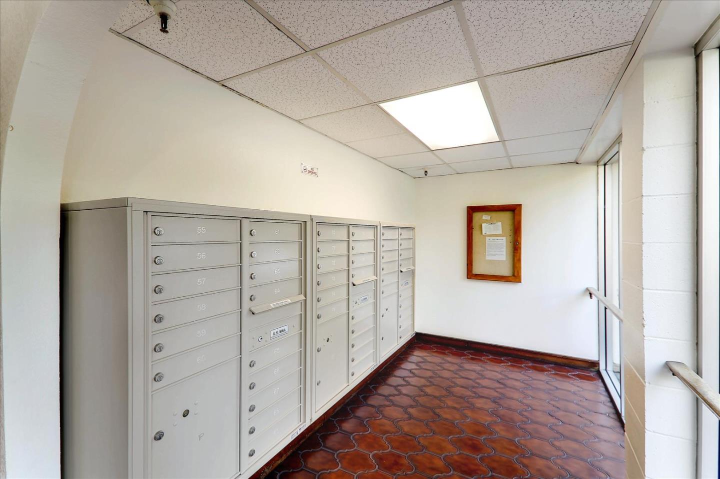 1775 Panda Way, Unit 103 Hayward, CA 94541 - Photo 31 of 33 a view of an empty room with wooden floor