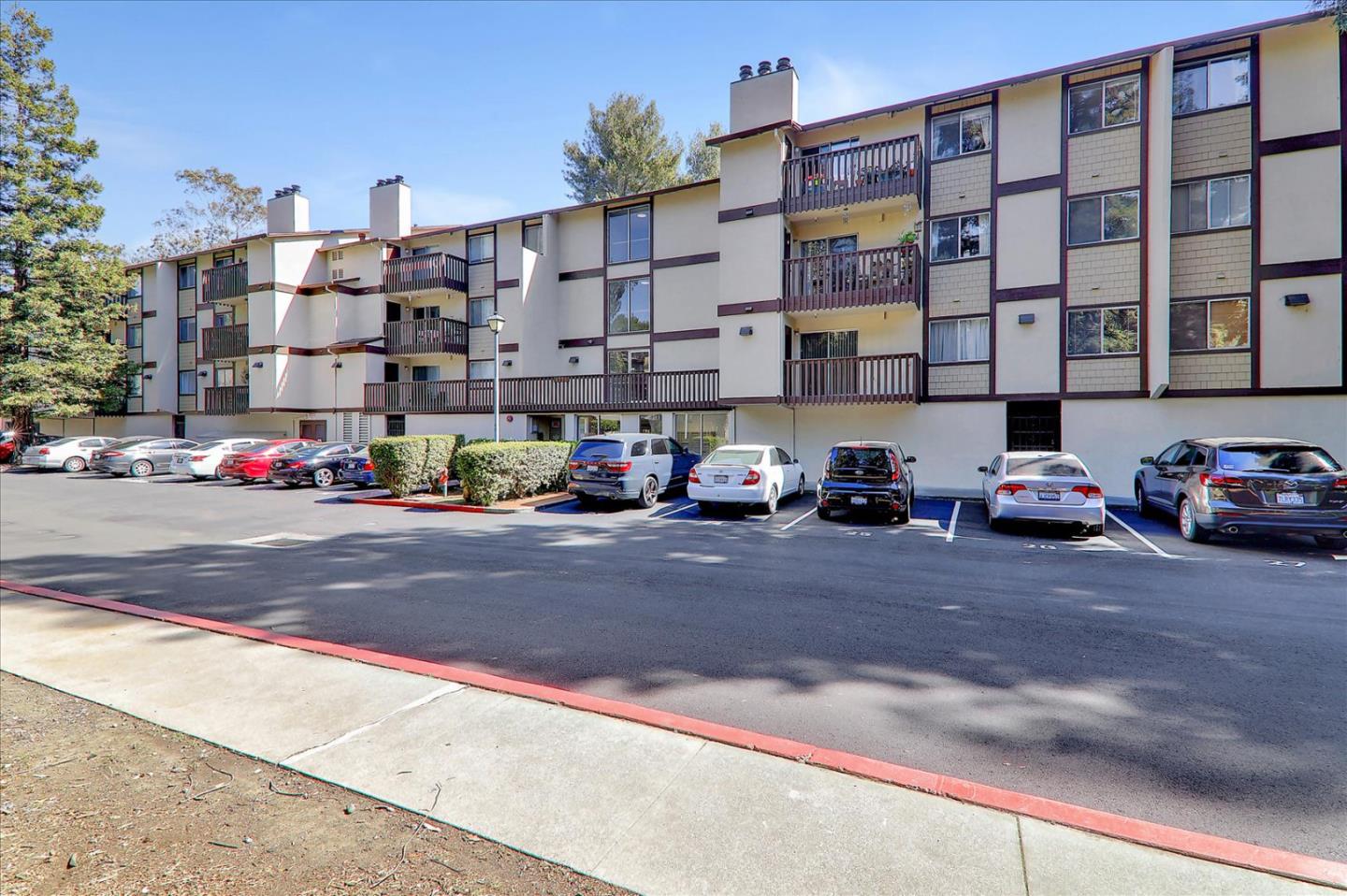 1775 Panda Way, Unit 103 Hayward, CA 94541 - Photo 5 of 33 a cars parked in front of a building
