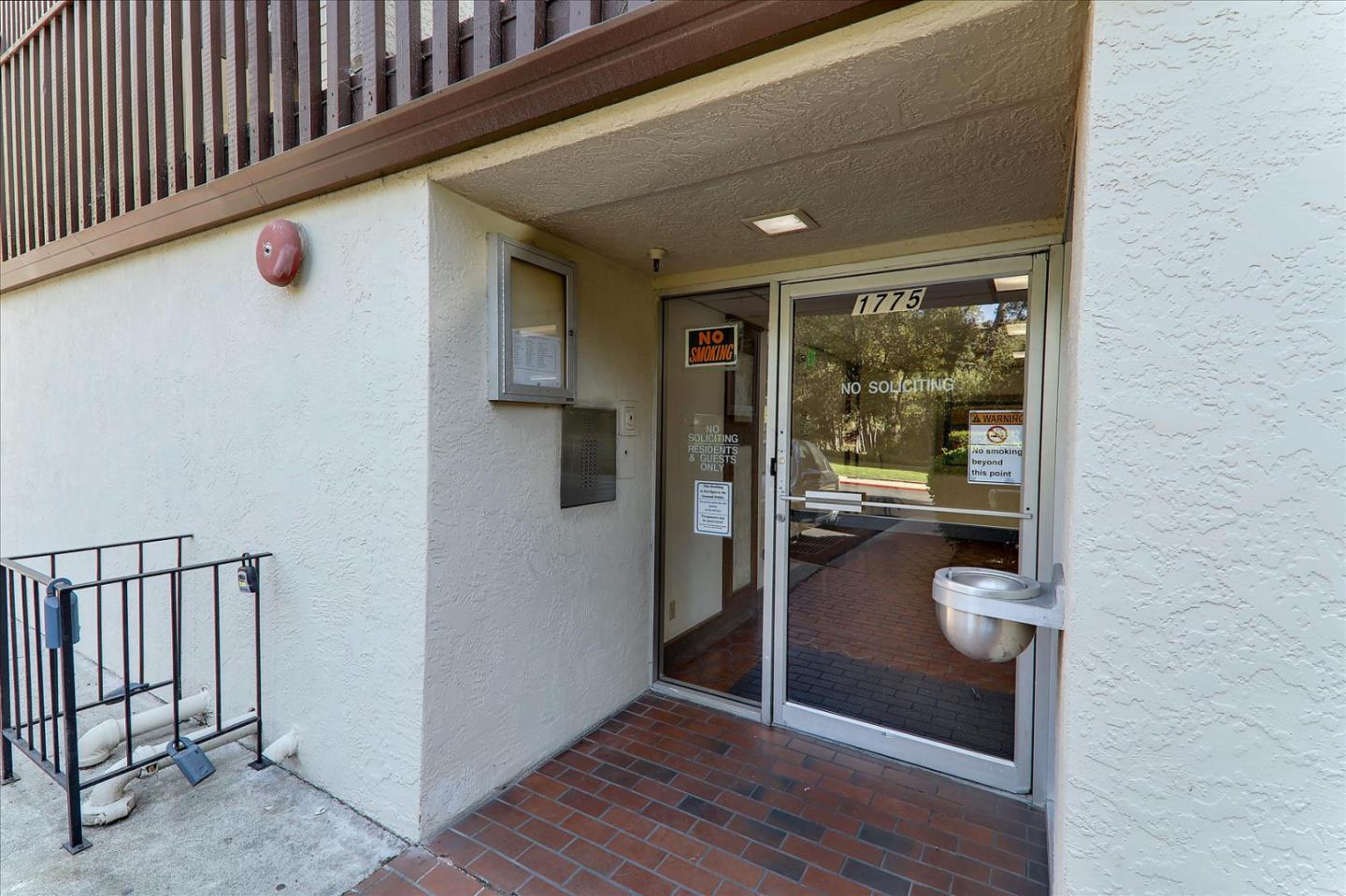 1775 Panda Way, Unit 103 Hayward, CA 94541 - Photo 10 of 33 a view of a hallway and a livingroom with furniture
