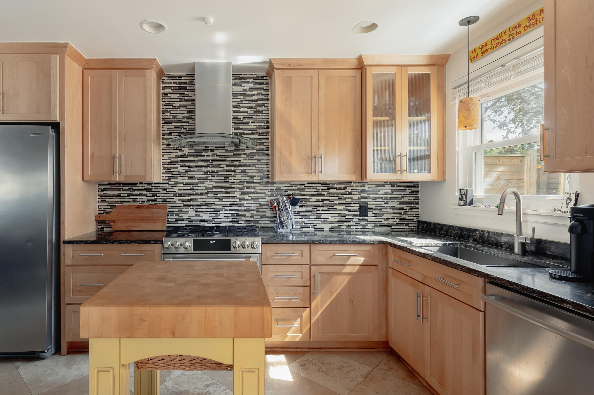 377 Pelican Circle Inlet Beach, FL 32461 - Photo 11 of 31 a kitchen with stainless steel appliances kitchen island granite countertop a sink and a stove