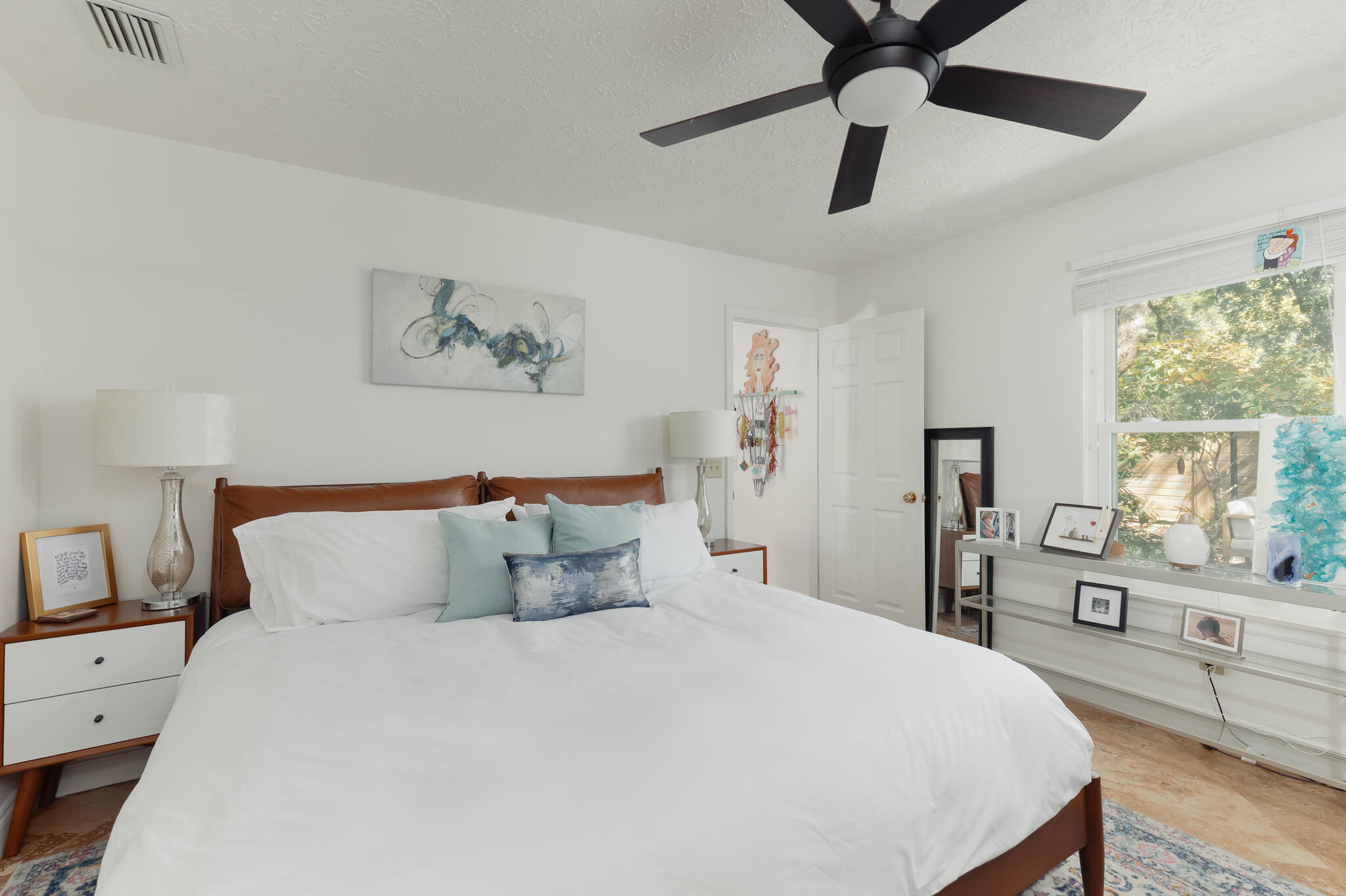 377 Pelican Circle Inlet Beach, FL 32461 - Photo 17 of 31 a bedroom with a large bed and a large window
