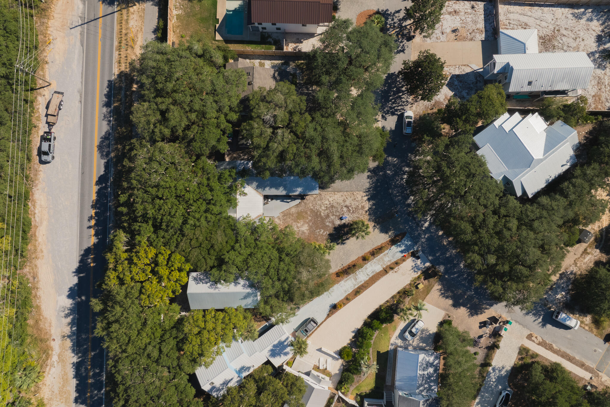 377 Pelican Circle Inlet Beach, FL 32461 - Photo 31 of 31 an aerial view of a house with a yard and lake view