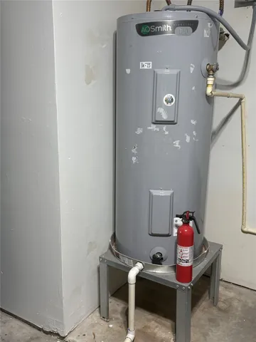 a room with furniture and a potted plant