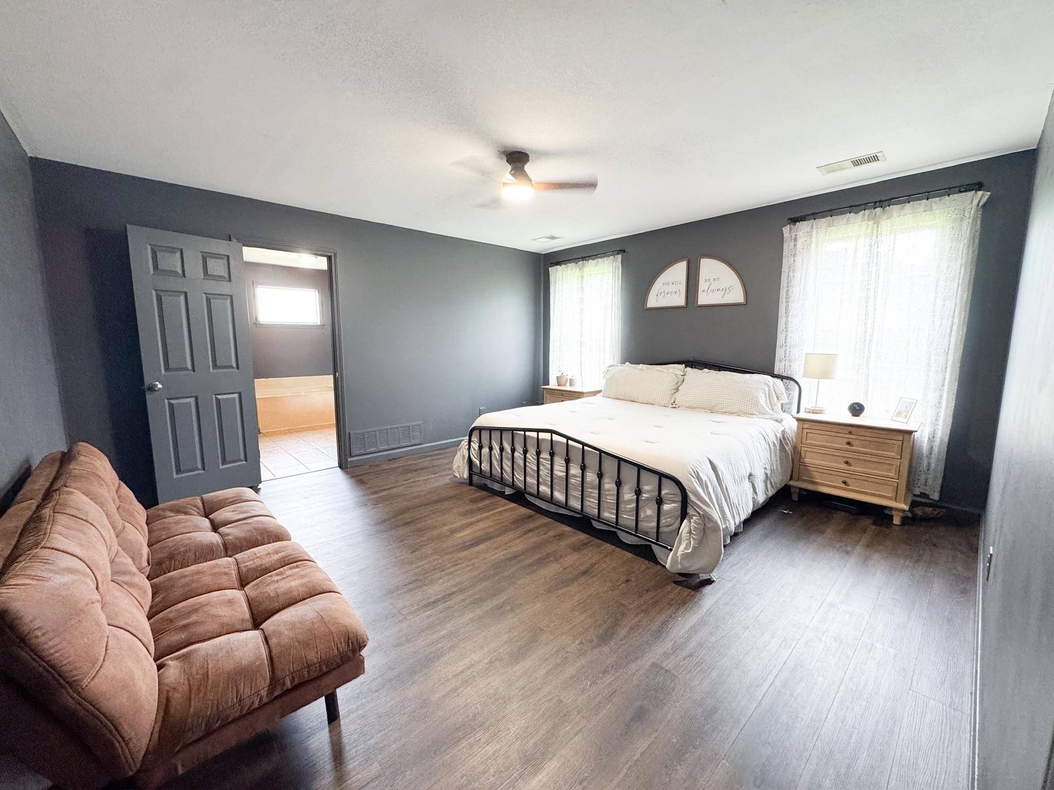4776 Campground Road Munford, TN 38058 - Photo 15 of 25 a bedroom with a bed couch and window