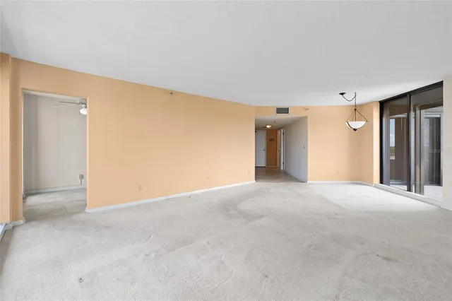 a kitchen with a refrigerator and a stove