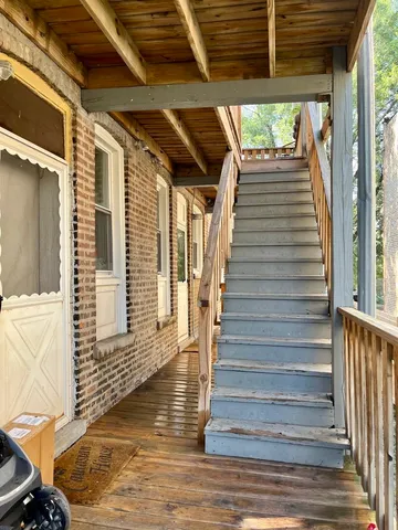 a view of entryway with wooden floor