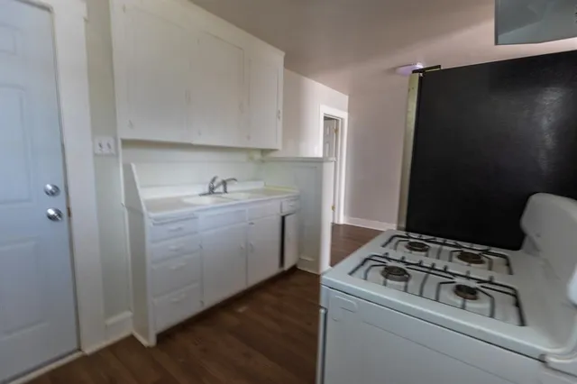 a view of kitchen and sink