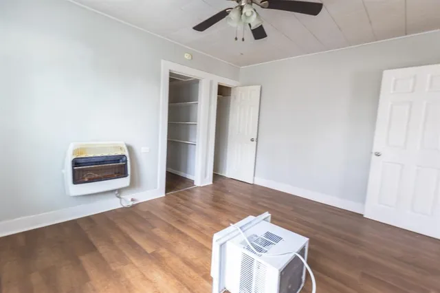 a kitchen with a stove and a refrigerator