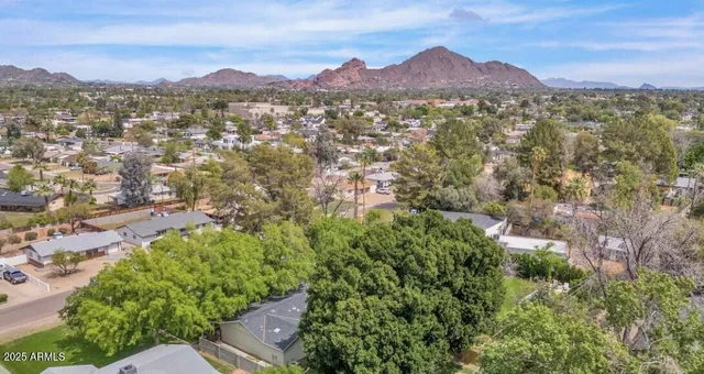 a view of a city with a mountain
