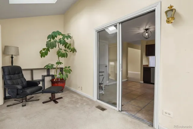 a view of a hallway with workspace