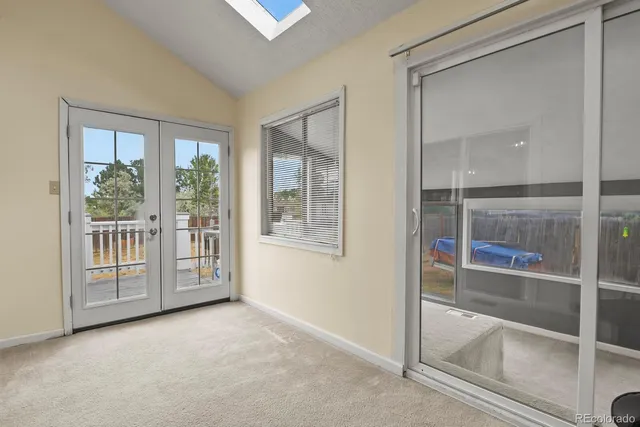 a view of an empty room and window