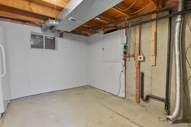 a view of a room with wooden walls