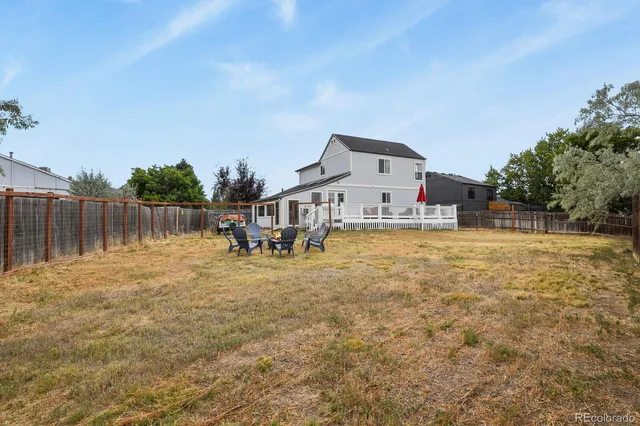 a house with trees in front of it