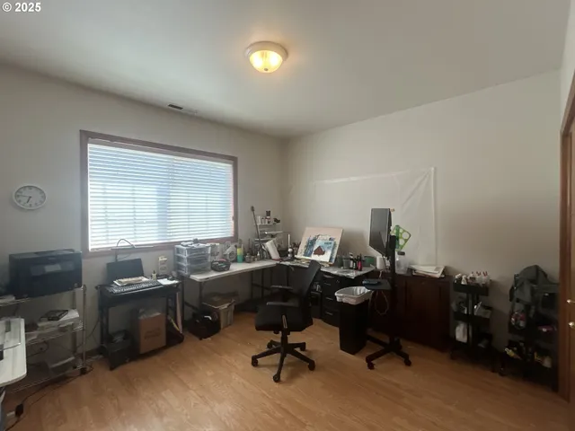 an aerial view of a house with swimming pool