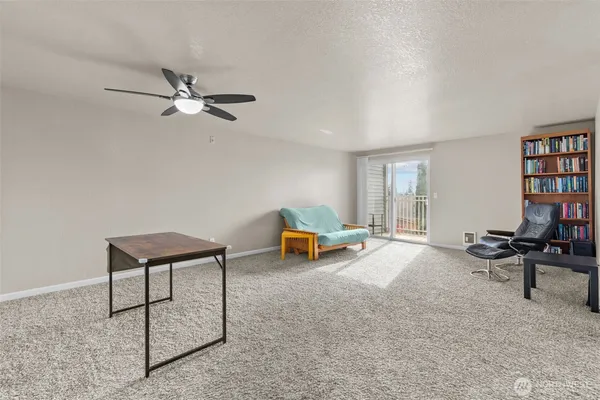 a living room with furniture and a couch