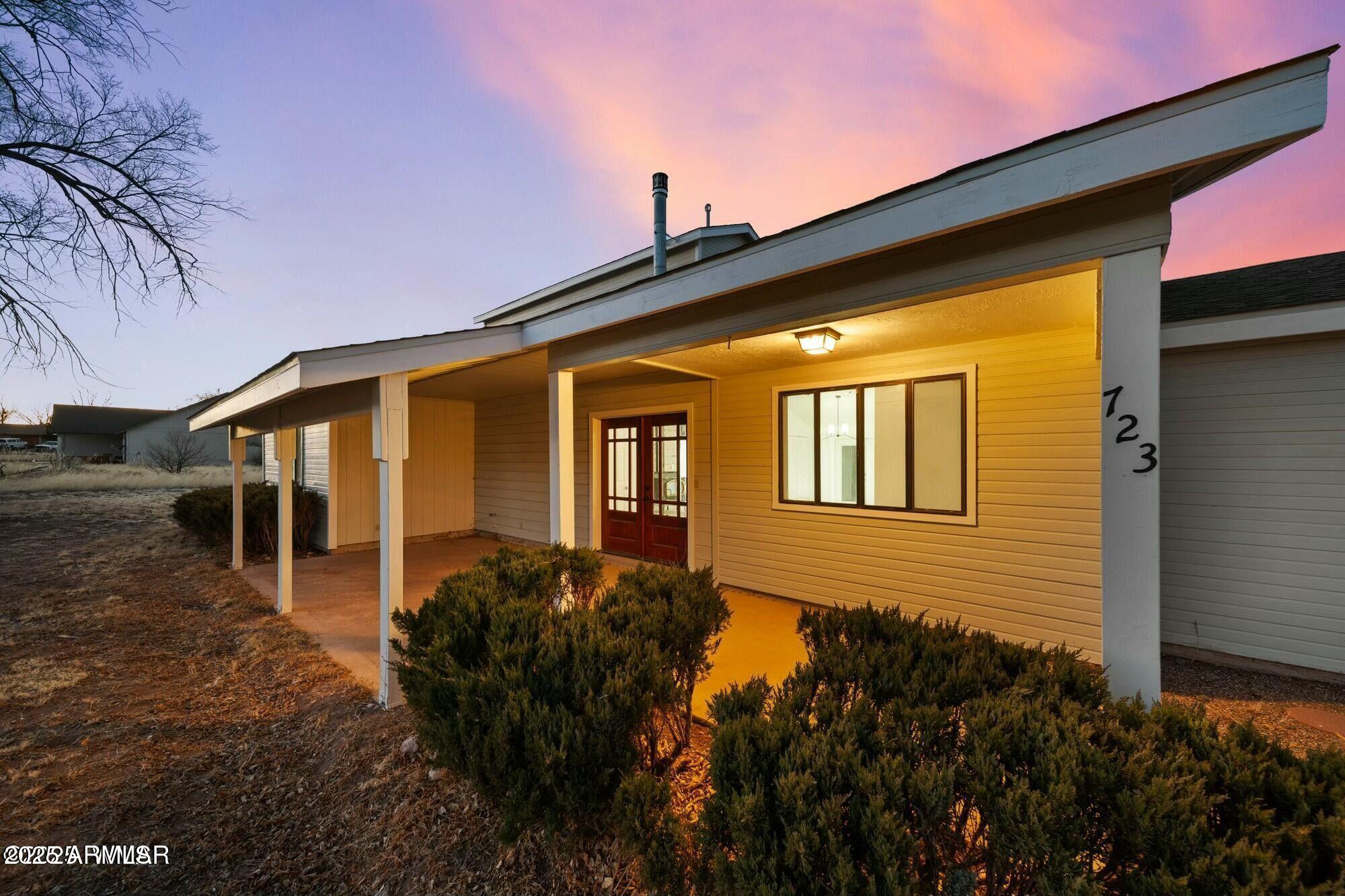 723 Tori Circle Springerville, AZ 85938 - Photo 12 of 47 a front view of a house with garden