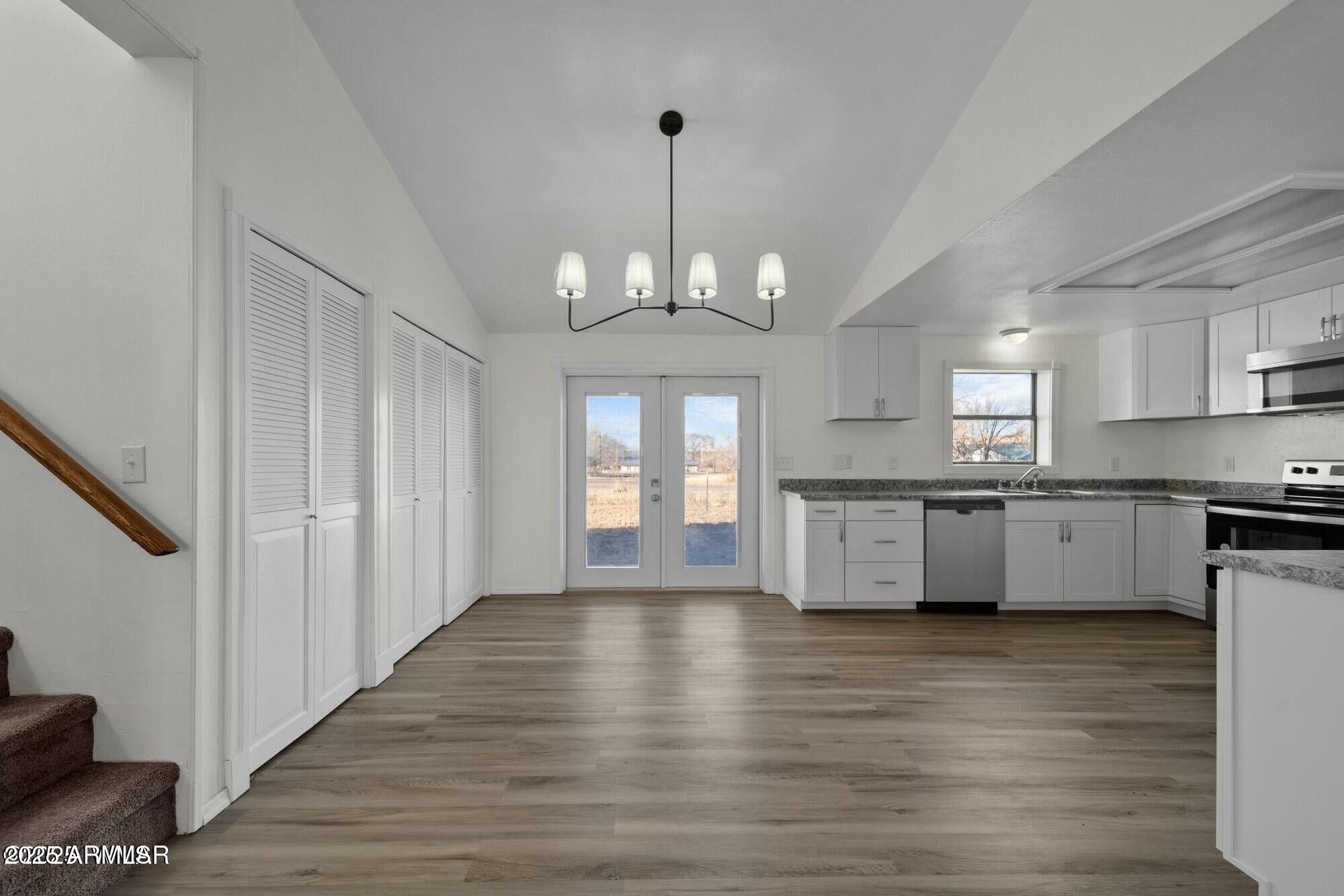 723 Tori Circle Springerville, AZ 85938 - Photo 17 of 47 a view of large kitchen with granite countertop stainless steel appliances sink and cabinets