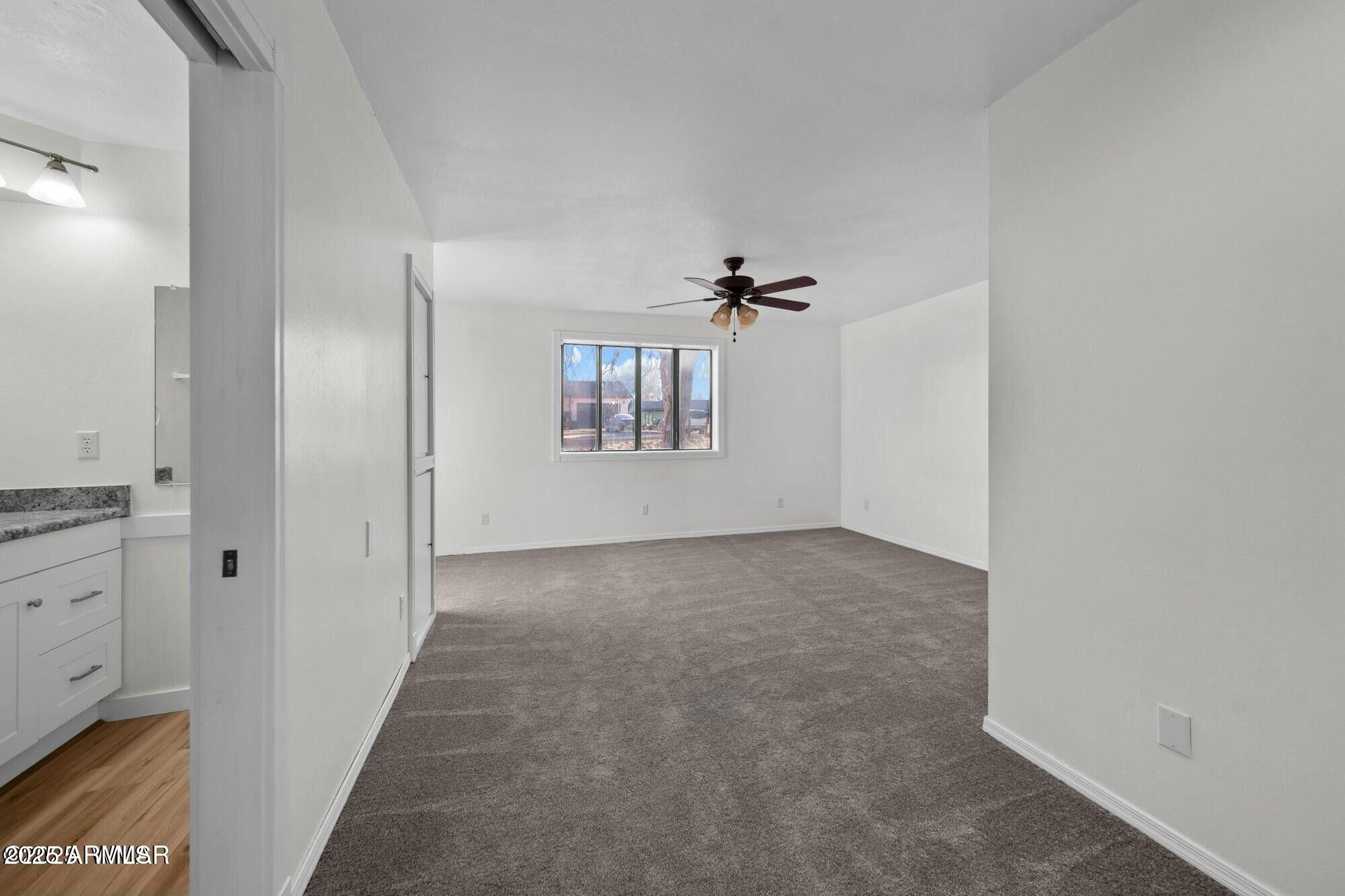 723 Tori Circle Springerville, AZ 85938 - Photo 27 of 47 a view of empty room with windows