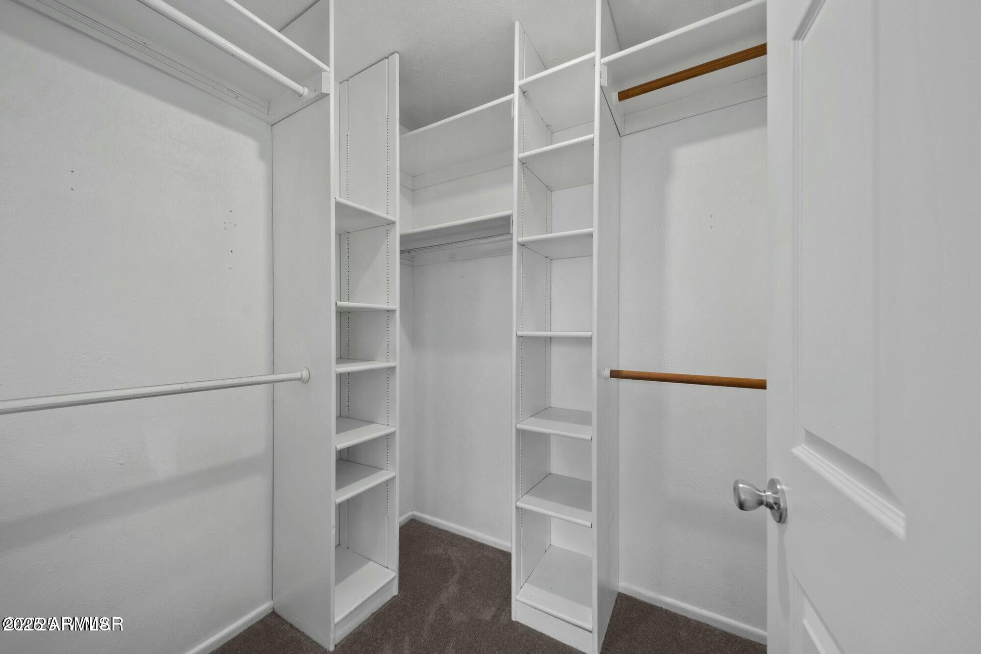 723 Tori Circle Springerville, AZ 85938 - Photo 29 of 47 a view of walk in closet with empty racks