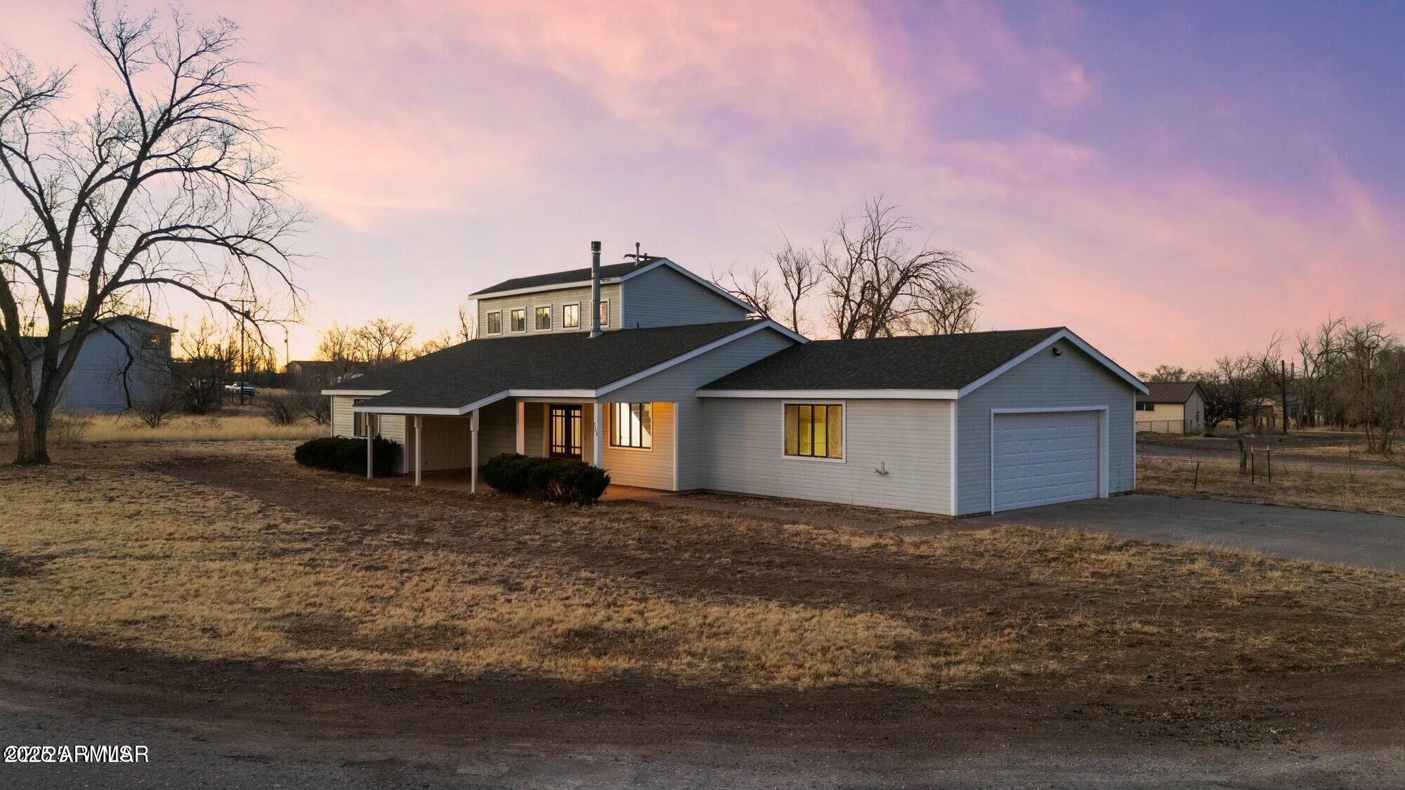 723 Tori Circle Springerville, AZ 85938 - Photo 3 of 47 a front view of a house with a yard
