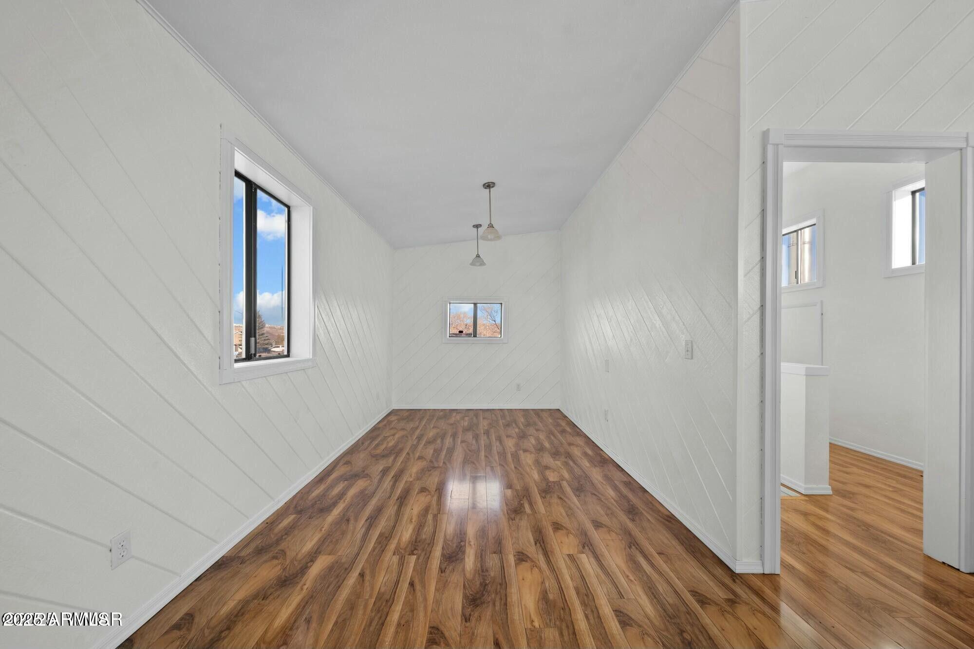 723 Tori Circle Springerville, AZ 85938 - Photo 33 of 47 a view of empty room with wooden floor