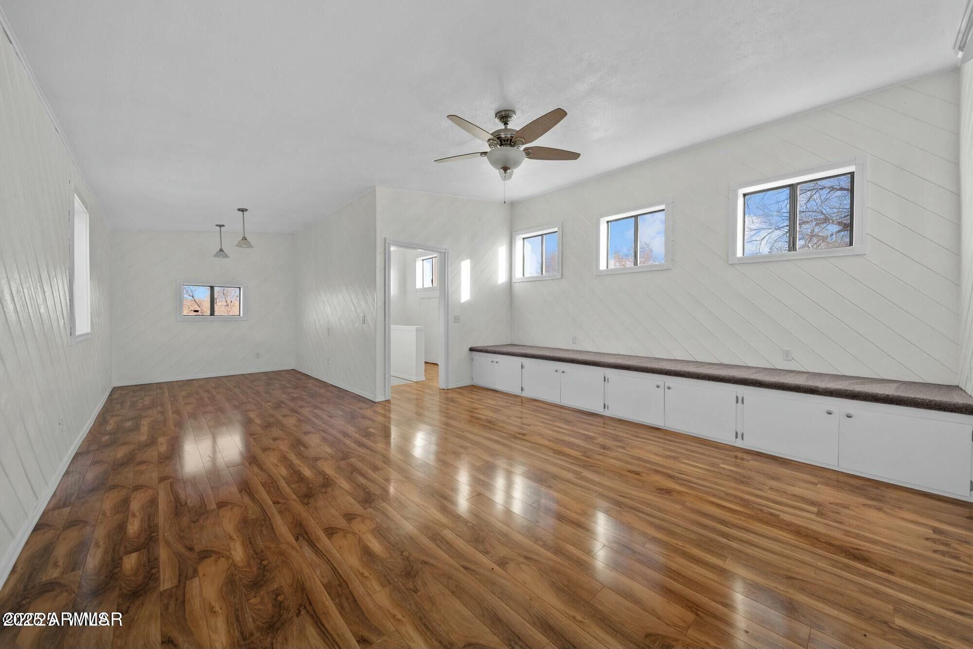 723 Tori Circle Springerville, AZ 85938 - Photo 34 of 47 a view of empty room with wooden floor