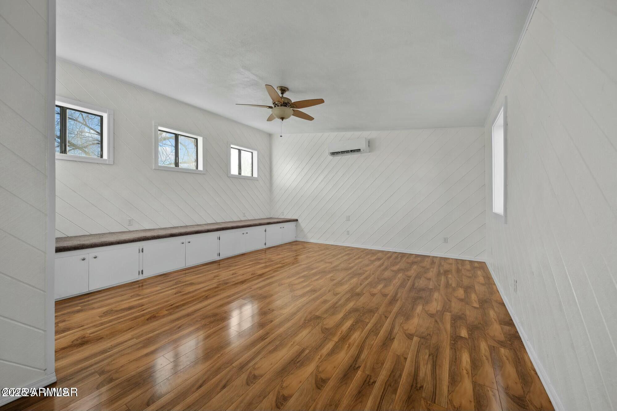 723 Tori Circle Springerville, AZ 85938 - Photo 35 of 47 a view of empty room with wooden floor
