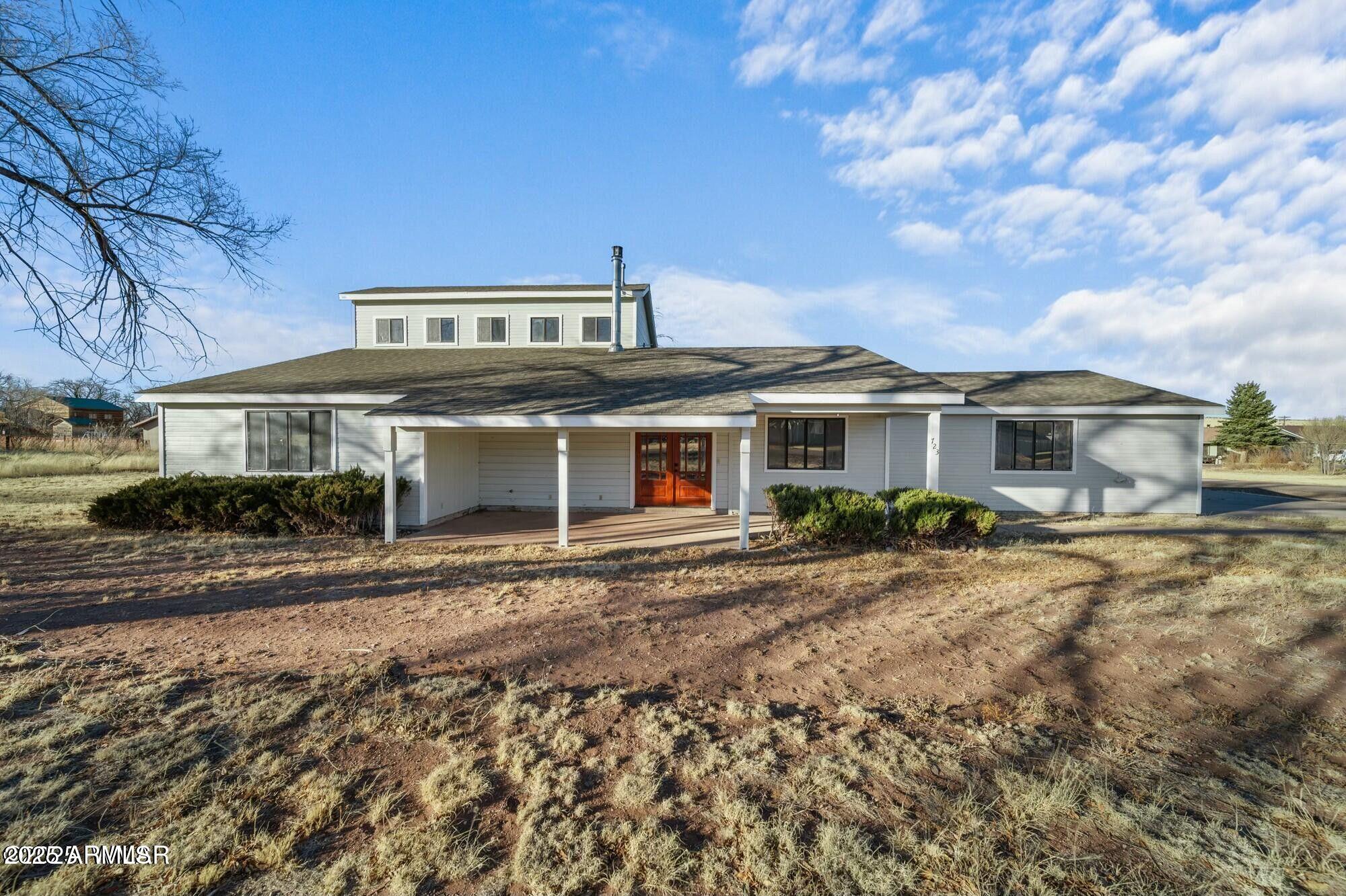 723 Tori Circle Springerville, AZ 85938 - Photo 39 of 47 a front view of a house with a garden