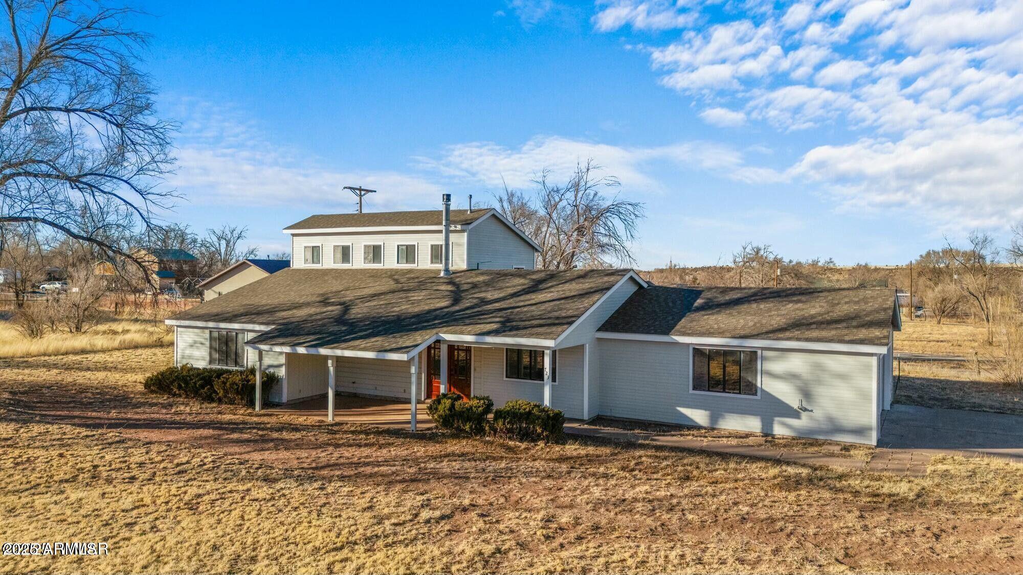 723 Tori Circle Springerville, AZ 85938 - Photo 40 of 47 a front view of a house with a yard