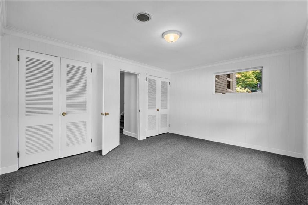 204 Rockspring Drive Thomasville, NC 27360 - Photo 27 of 39 Lower Level Bedroom 3