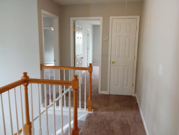 a view of a staircase and door