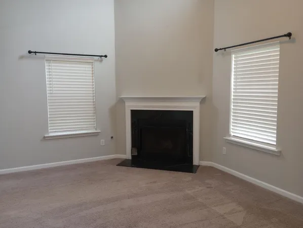 a view of empty room with a window