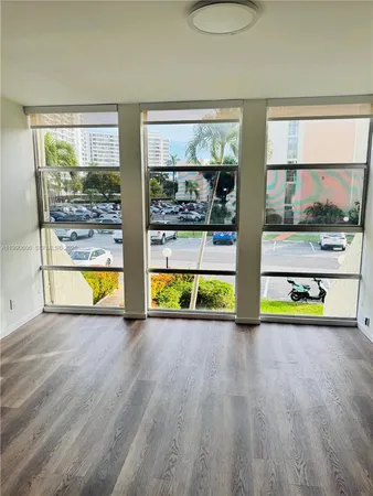 a view of a swimming pool and living room