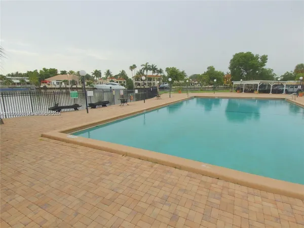 a view of a swimming pool and lake