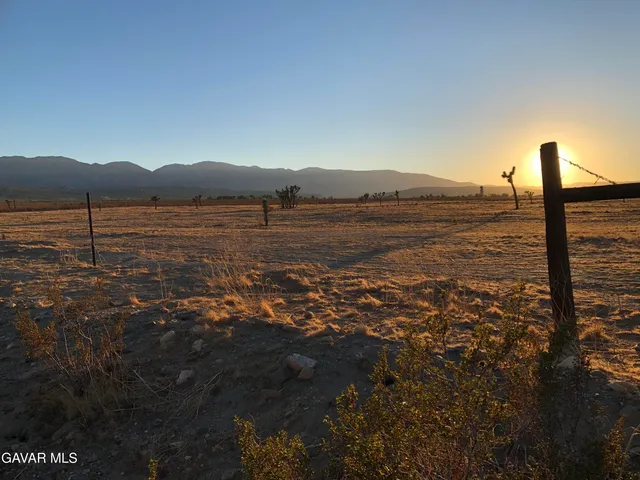 a view of lake with mountain