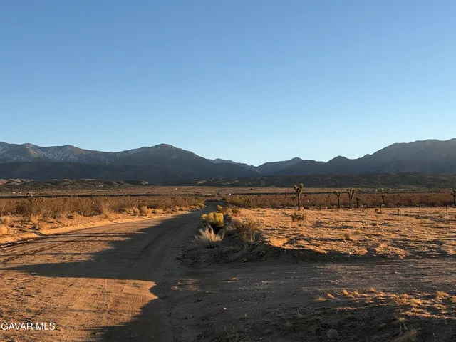 a view of a lake with a mountain in the background