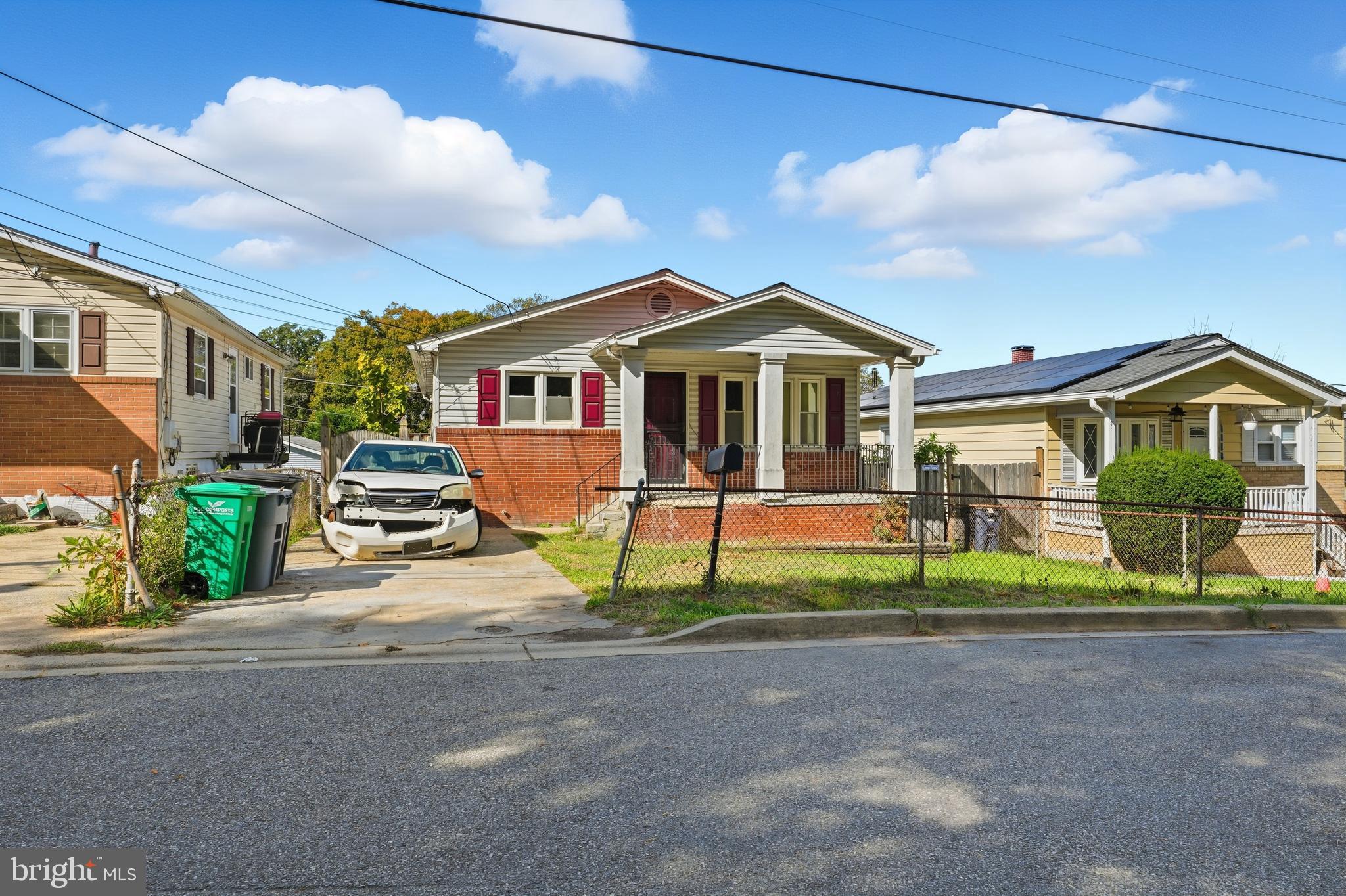 a view of front of house with a yard