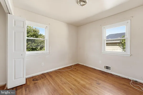 a view of a room that has a window in it