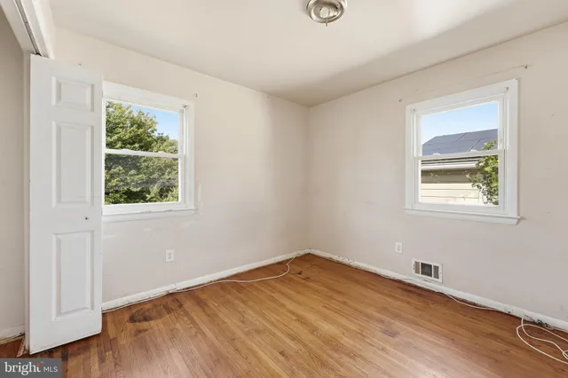 a view of a room that has a window in it