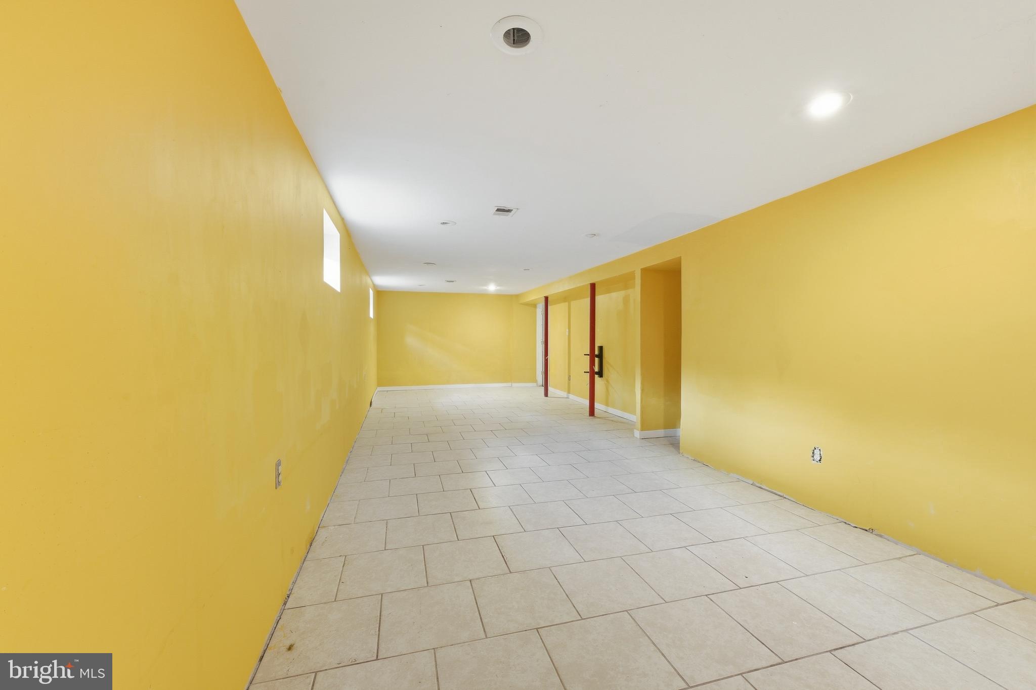 1213 Quo Avenue Capitol Heights, MD 20743 - Photo 10 of 15 a view of livingroom with painted wall and a large window