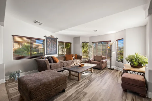 a view of a patio with a yard