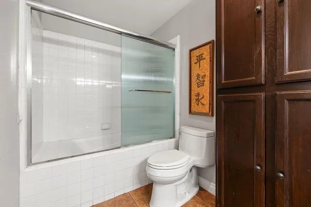 an aerial view of residential house and green space