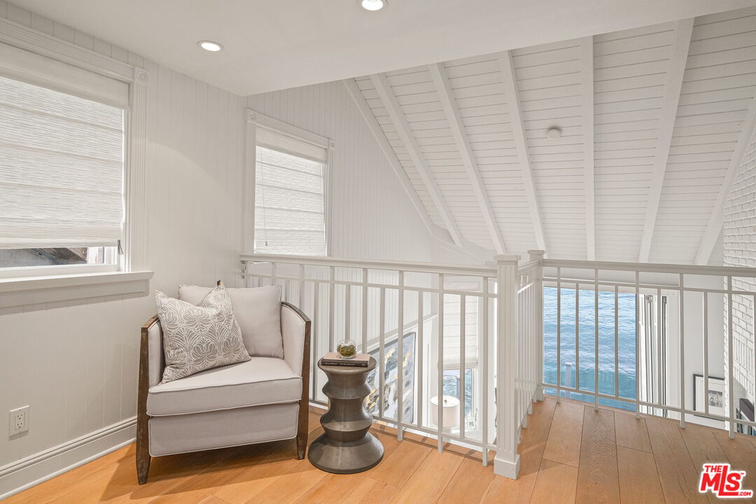 19236 Pacific Coast Highway Malibu, CA 90265 - Photo 23 of 41 a living room with furniture and a window