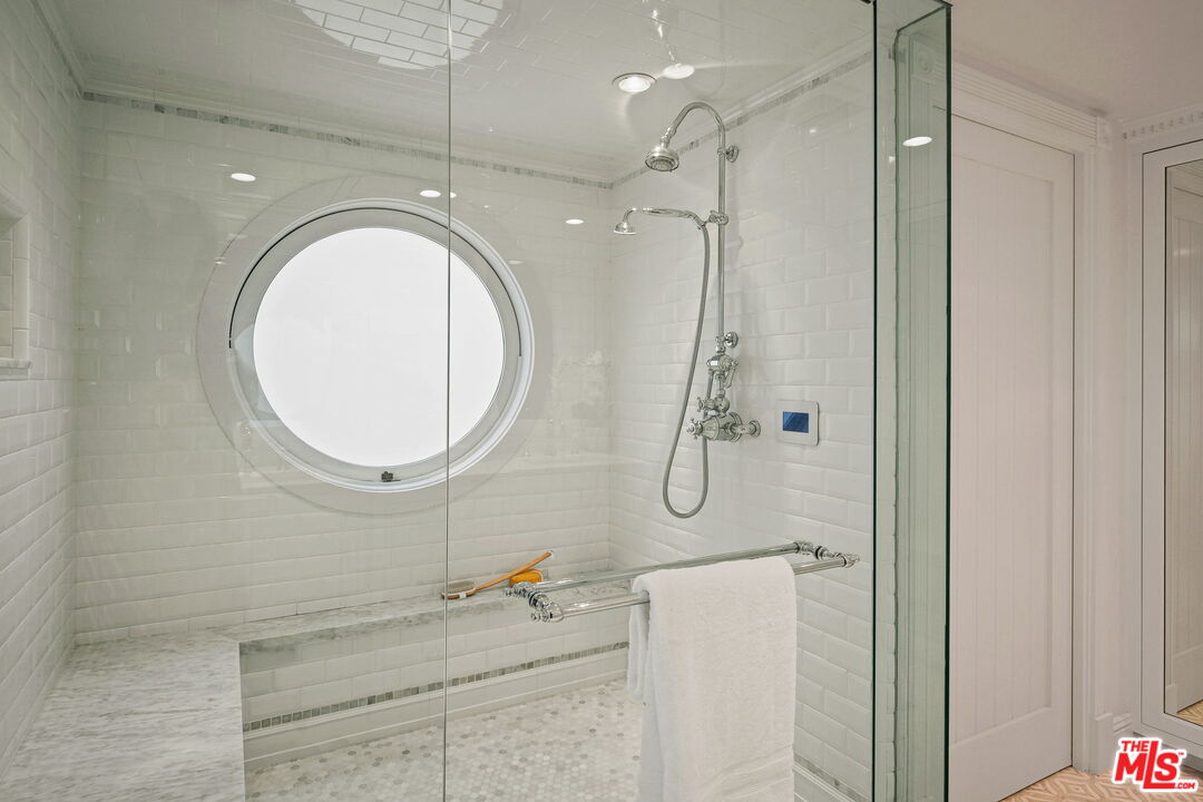 19236 Pacific Coast Highway Malibu, CA 90265 - Photo 32 of 41 a bathroom with a sink a toilet and shower