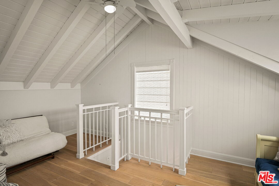 19236 Pacific Coast Highway Malibu, CA 90265 - Photo 34 of 41 a view of a livingroom with stairs and a couch