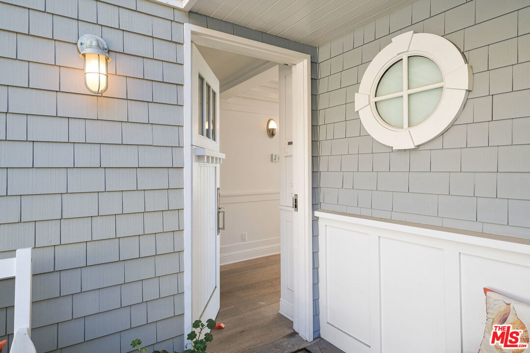 19236 Pacific Coast Highway Malibu, CA 90265 - Photo 9 of 41 a bathroom with a mirror and a shower