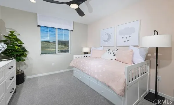 a bathroom with a double vanity sink mirror and shower