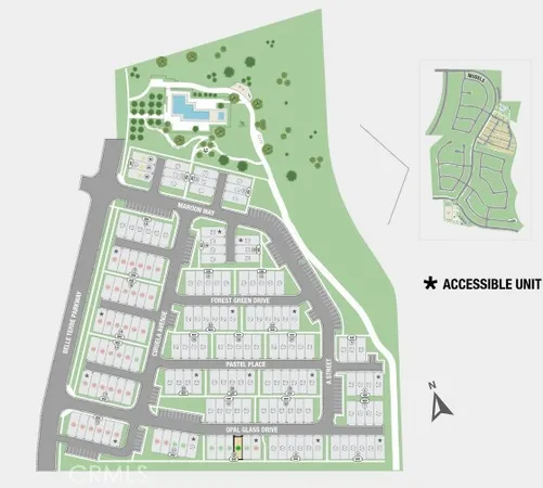 a bedroom with a bed mirror and a window