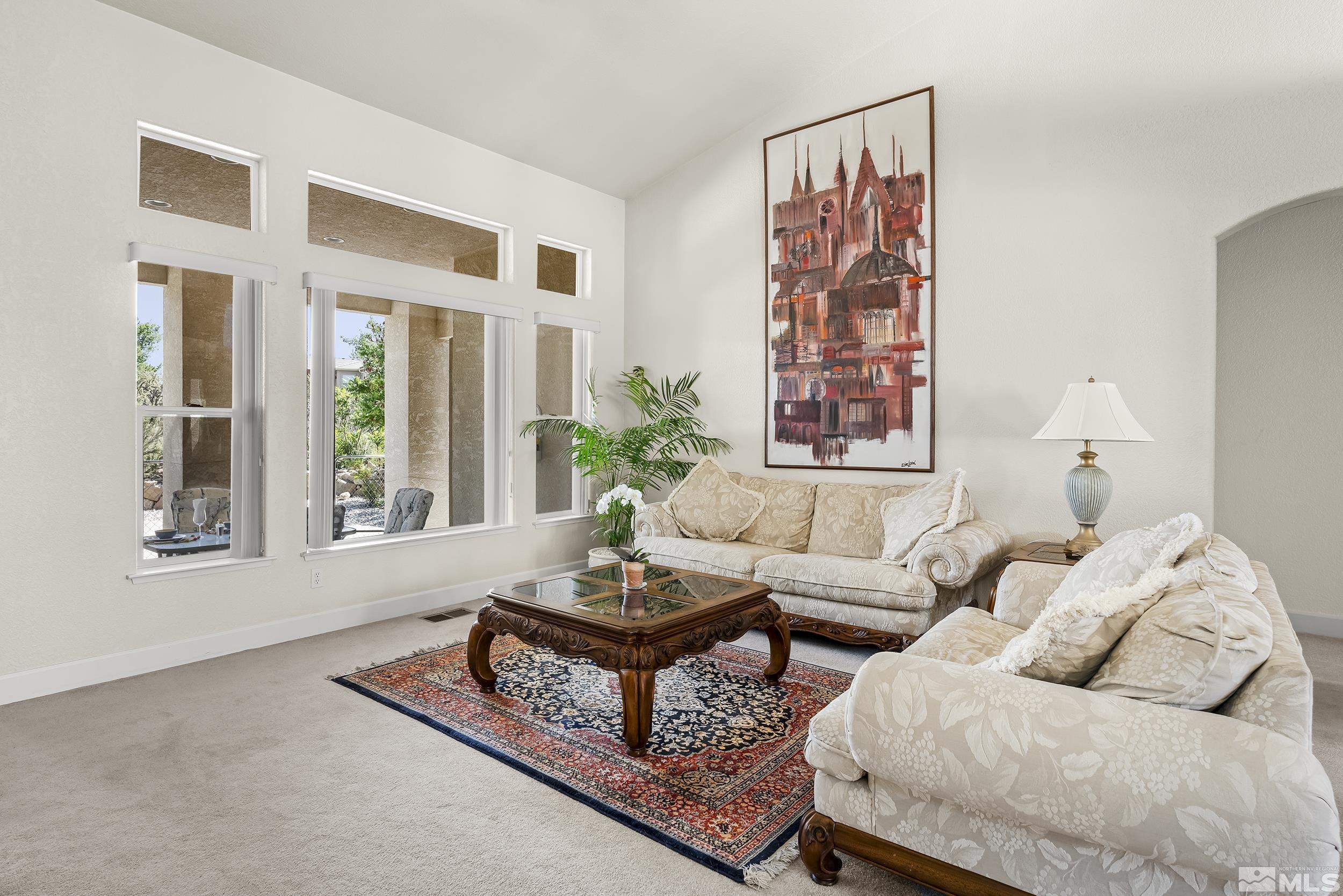 1540 Star Way Reno, NV 89511 - Photo 7 of 37 a living room with furniture and a large window