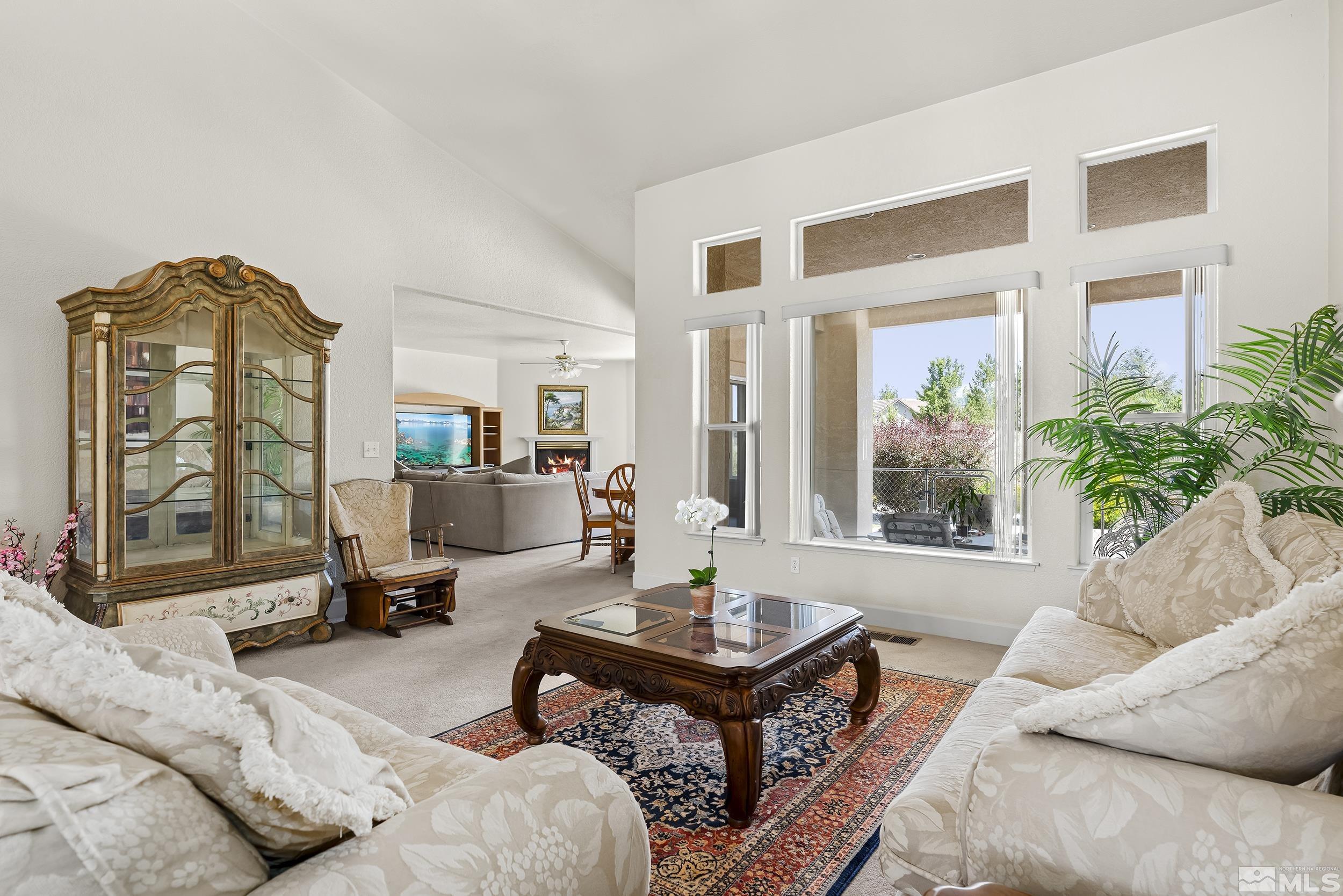 1540 Star Way Reno, NV 89511 - Photo 8 of 37 a living room with furniture and a window